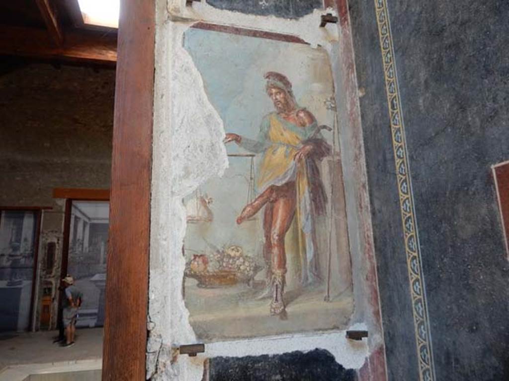 VI.15.1 Pompeii. May 2017. Painting of a bearded Priapus in vestibule, after renovation. Photo courtesy of Buzz Ferebee.
