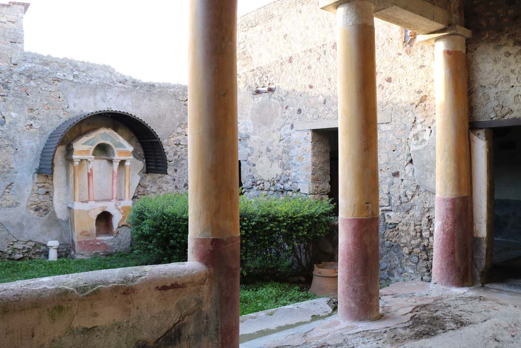 VI.15.8 Pompeii. December 2018.
Looking north-west from portico towards household shrine in garden area with doorway from atrium, on right.
Photo courtesy of Aude Durand.