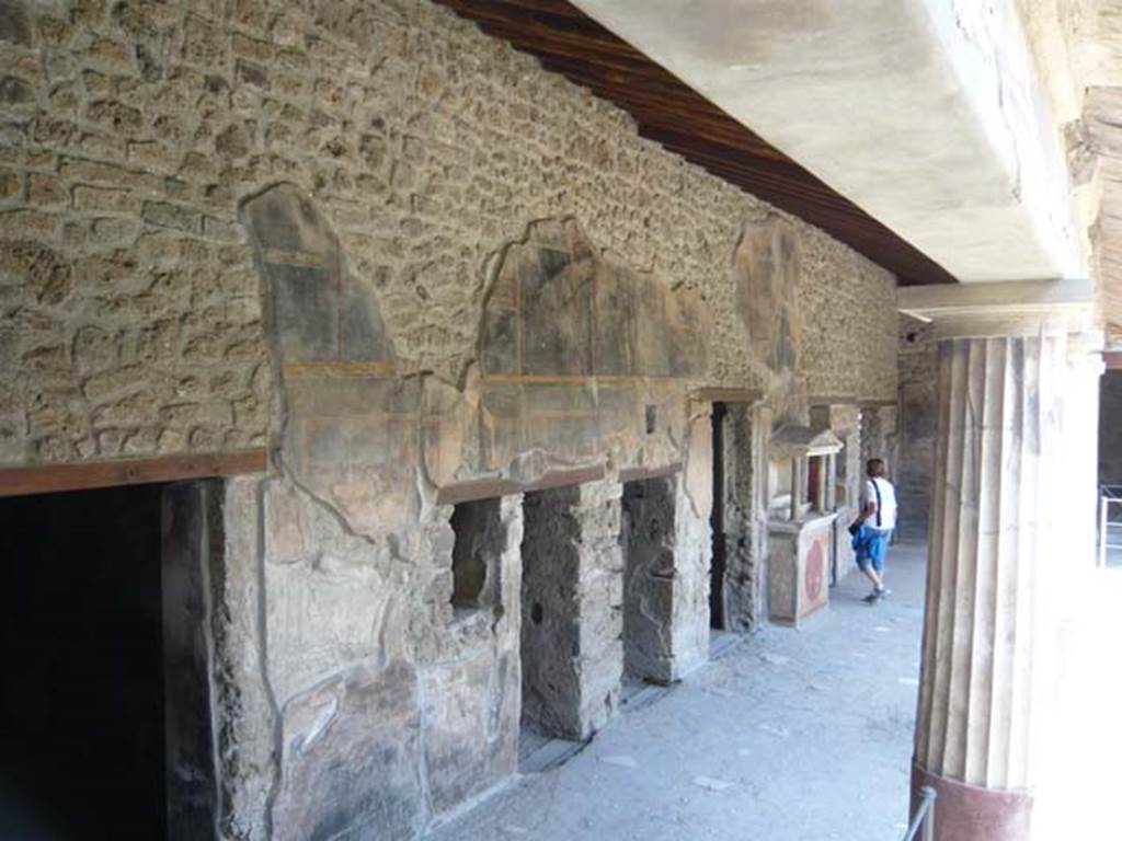 VI.16.7 Pompeii. June 2013. Looking east along north portico, with doorways to rooms M, L, K and J.
Photo courtesy of Buzz Ferebee.