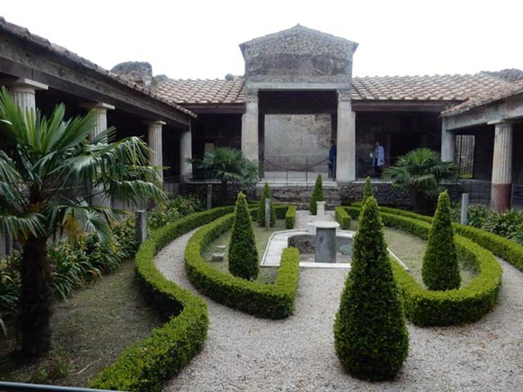 VI.16.7 Pompeii. May 2016. Room F, looking west across peristyle garden from east portico.
In the centre is a marble pool and around the garden were several statues. Photo courtesy of Buzz Ferebee.
