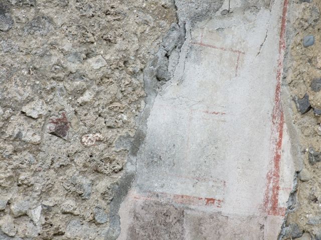 VI.16.13 Pompeii.  Shop and workshop.  December 2007.  Painted plaster in north west corner of shop.