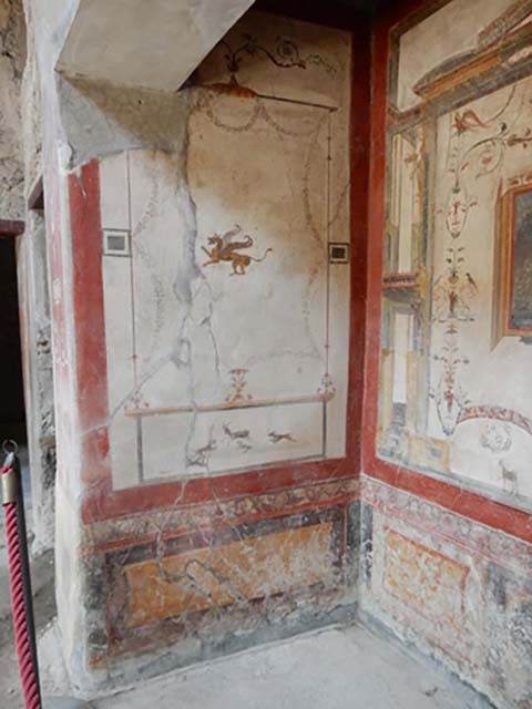 VI.16.15 Pompeii. December 2006. West wall of room in centre of South wall of Atrium. Detail of wall painting.