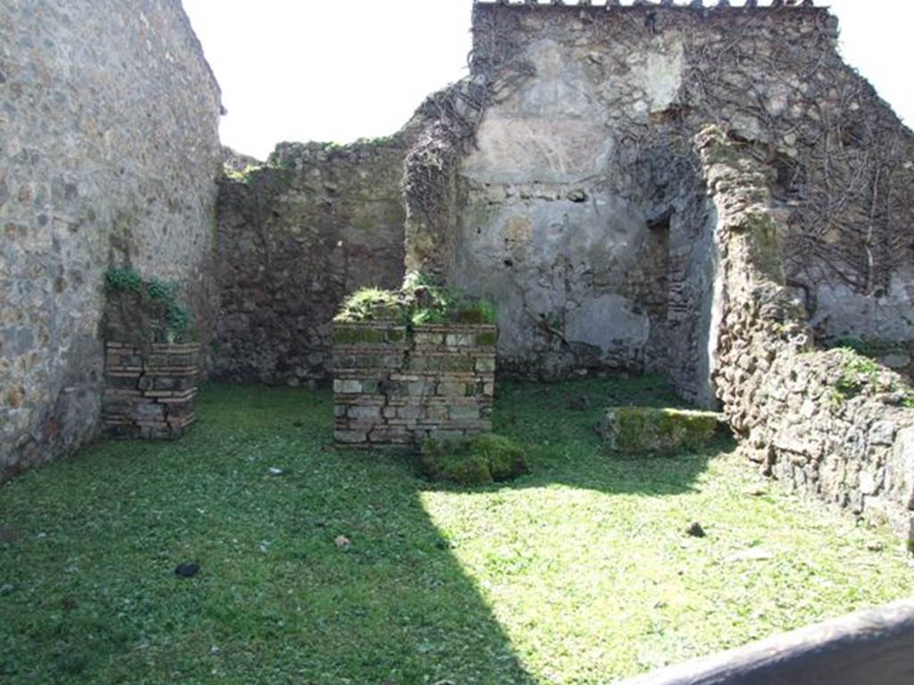 VI.16.18 Pompeii. March 2009. Looking west from entrance across workshop. According to NdS, the workshop itself was rather large with rough walls and concrete floor. In the south-east corner would have been the latrine, and in the north-east corner would have been remains of a small wall that could have been a large ruined hearth. The excavation of this workshop was started on 5th November 1903. See Notizie degli Scavi di Antichit�, 1908, (p.180).
