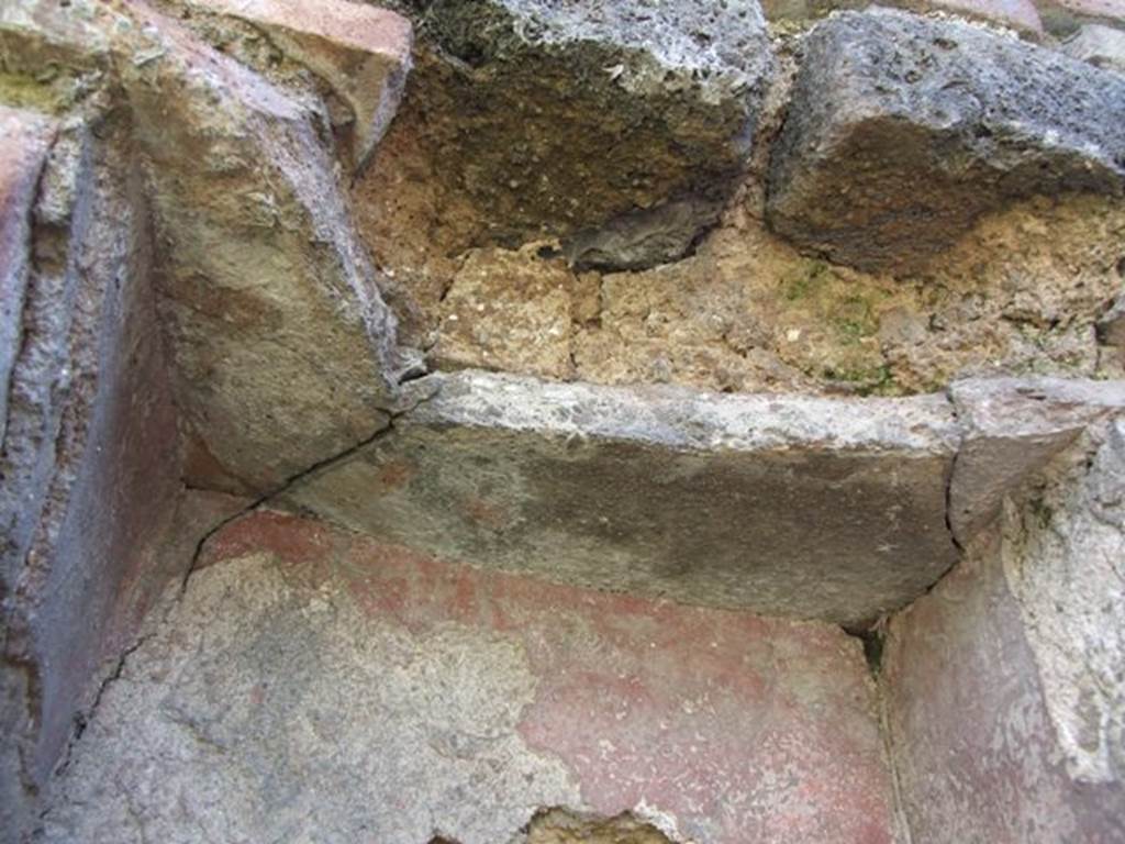 VI.16.20 Pompeii. March 2009. Top of niche, with remains of painted decoration.