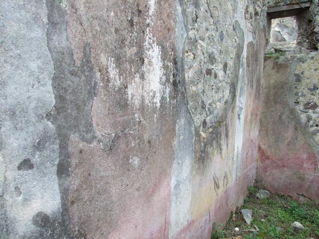 VI.16.29 Pompeii. March 2009. Demolished wall of room 6, on east side of atrium.   According to Sogliano, high up on the left of the east wall were two semicircular niches. In the middle part of the same wall was a big window.
In the south-east corner was a hearth. See Not. Scavi, 1908, 280.  See also Giacobello, F., 2008. Larari Pompeiani: Iconografia e culto dei Lari in ambito domestico.  Milano: LED Edizioni. (p.243)

