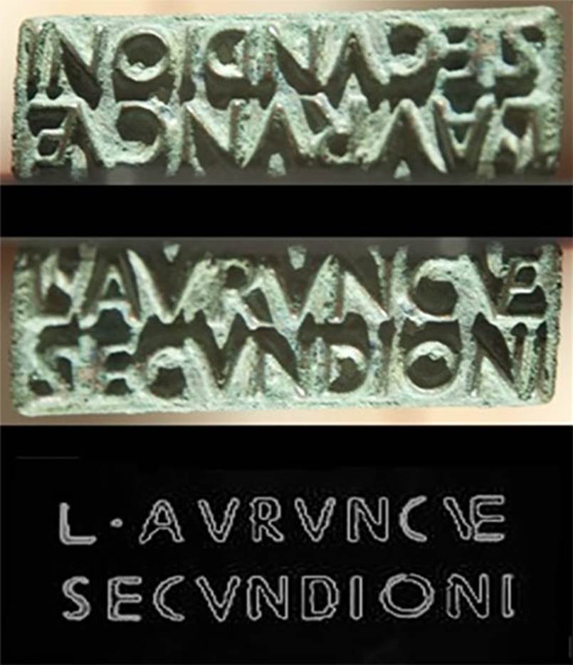VI.16.32/33 Pompeii. Found 14th June 1904. Bronze sigillo or stamp of L. Aurunculeius Secundio.
Top is the face of the seal.
Centre is the reversed image.
Bottom is a drawing showing the outline of the stamp produced by the seal.
Composite photo courtesy of Dan Pater. SAP inventory number 55814.