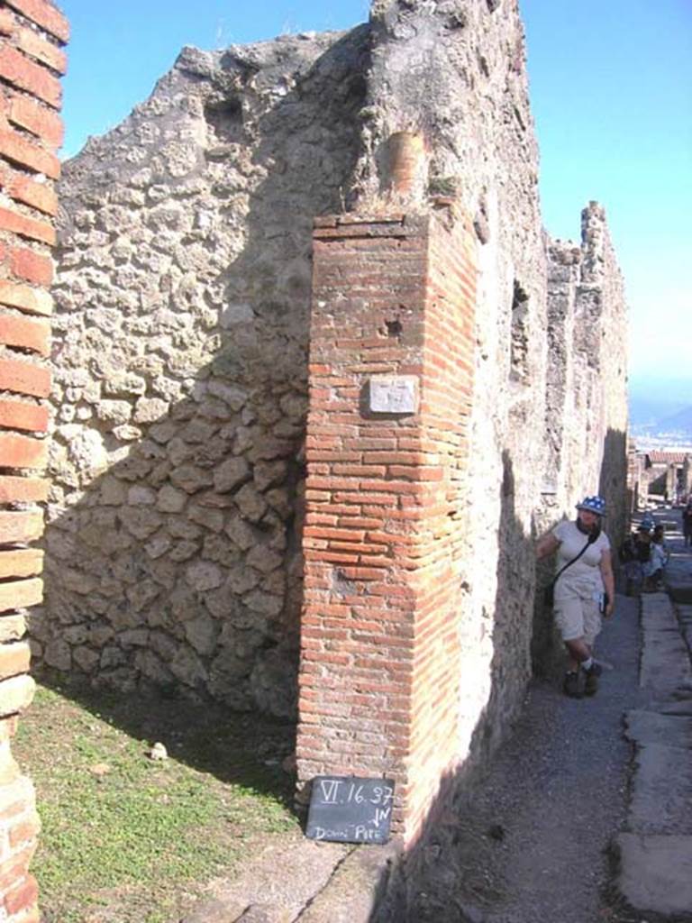VI.16.37 Pompeii. July 2008. Downpipe in brick door pilaster on south side of entrance doorway. Photo courtesy of Barry Hobson.