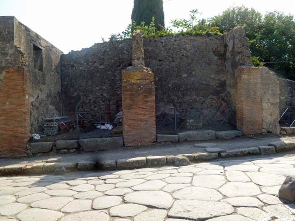 VI.17.20/19 Pompeii. May 2011. Looking west to VI.17.20, on left, on Via Consolare. 
Photo courtesy of Michael Binns. According to Fiorelli � the dwelling at VI.17.23/25 had six shops attached to it, along the Via Consolare. See Pappalardo, U., 2001. La Descrizione di Pompei per Giuseppe Fiorelli (1875). Napoli: Massa Editore, p. 159.
