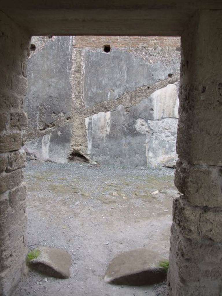 VII.1.8 Pompeii. December 2007. Room 8, women�s baths anteroom. Doorway from gymnasium C, leading to women�s baths and praefurnium 7.
