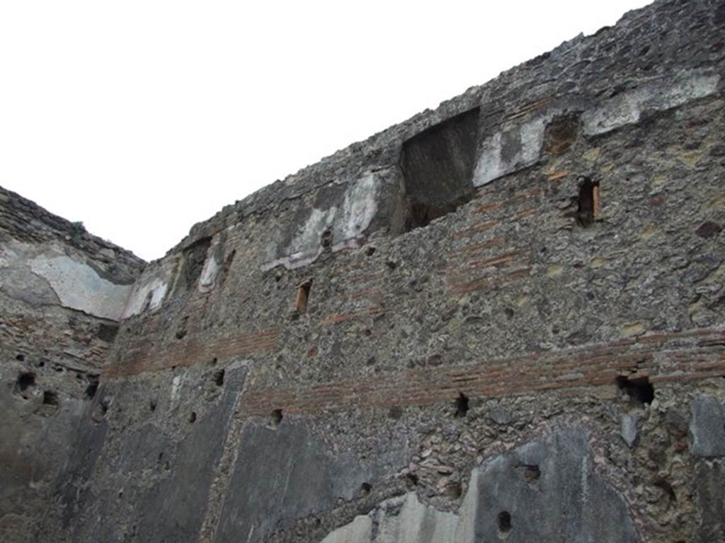 VII.1.8 Pompeii. December 2007. Room 8, women�s baths anteroom, east wall showing upper floor.