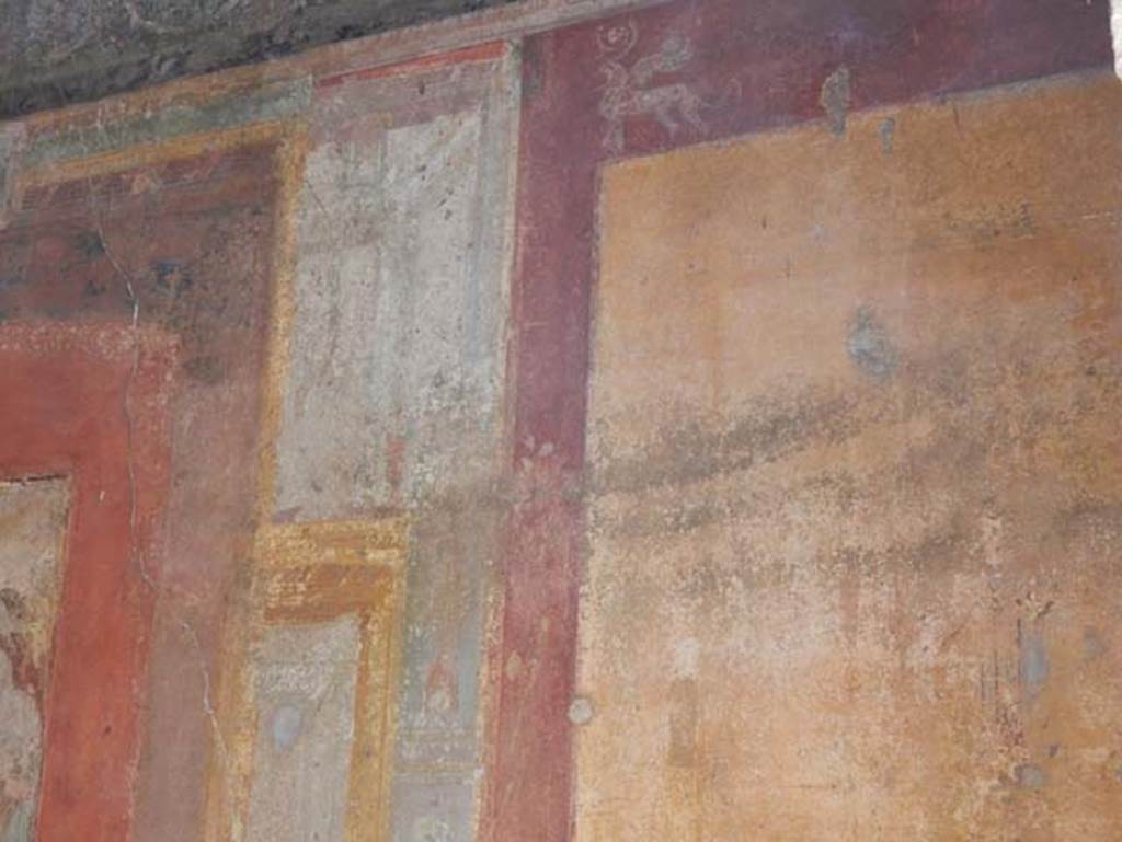 VII.1.47 Pompeii. May 2017. Exedra 10, painted decoration from south end of east wall. Photo courtesy of Buzz Ferebee.
