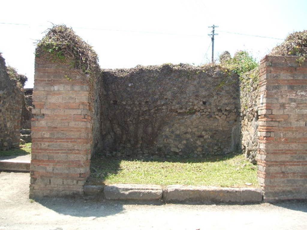 VII.2.4 Pompeii. December 2007. North wall and north-west corner.
Eschebach said there were steps to the upper floor at the rear on the right.