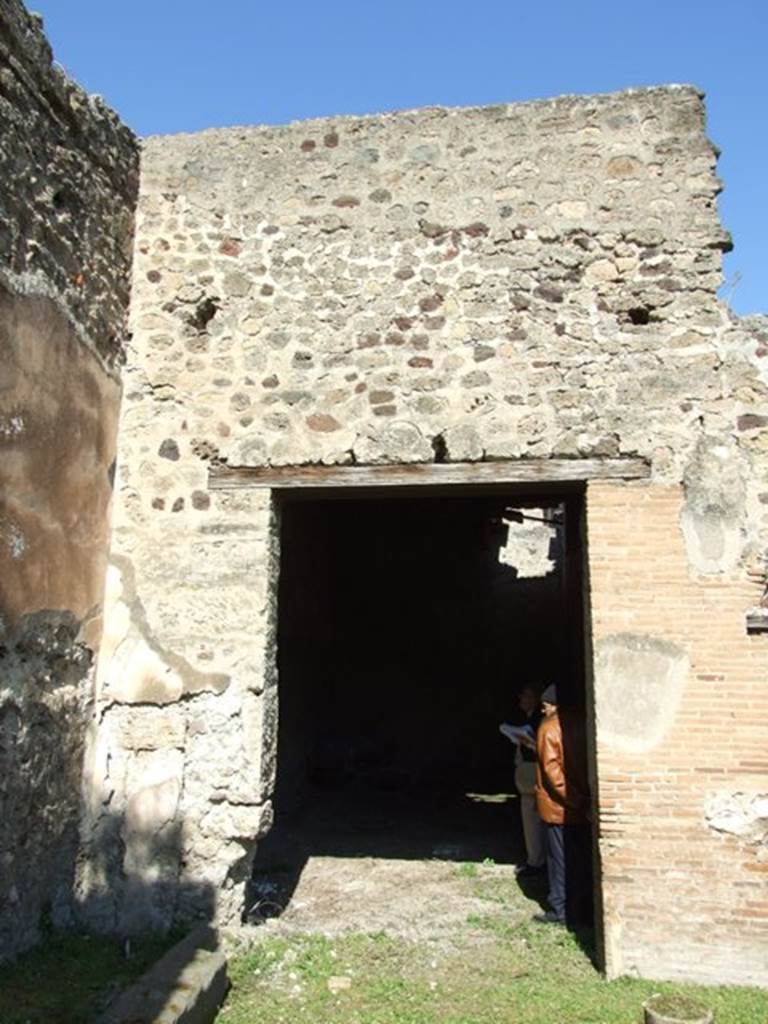 VII.2.16 Pompeii. March 2009. Room 20, north-east corner and east wall of triclinium.