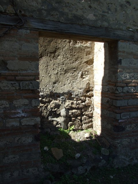 VII.2.18 Pompeii. March 2009. Room 19. Kitchen and hearth, looking north.