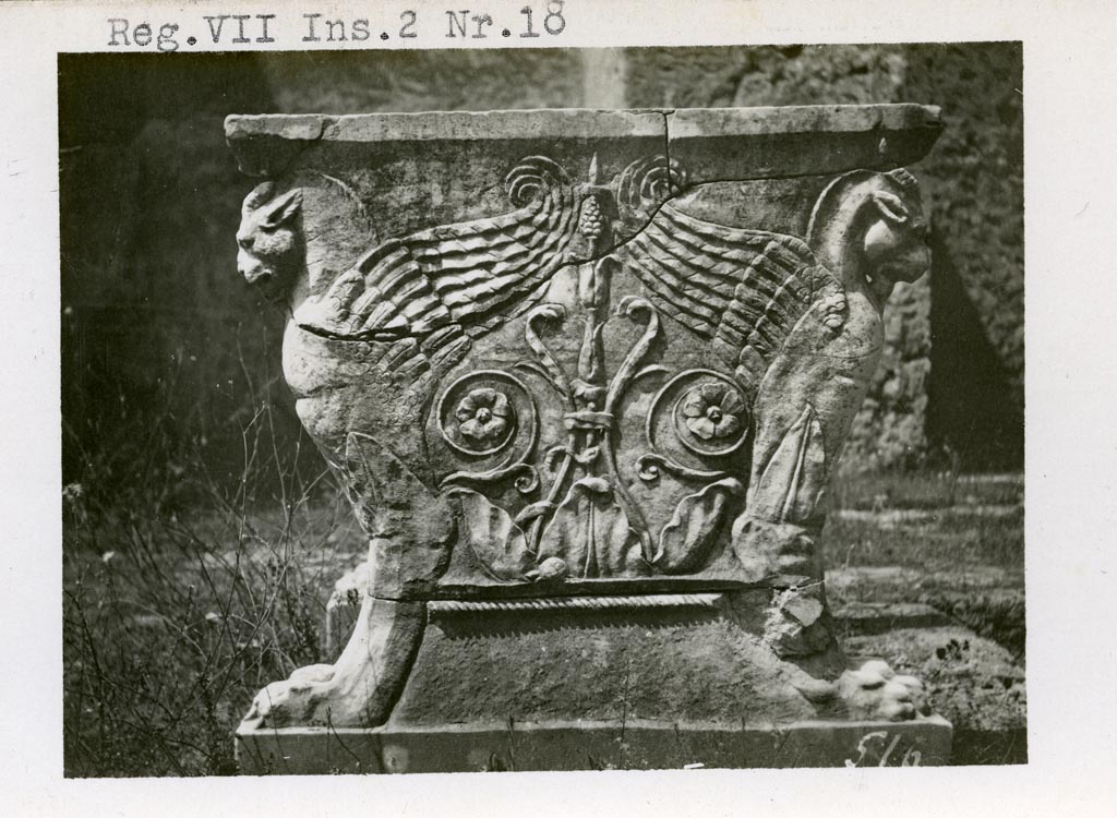 VII.2.18 Pompeii. Pre-1937-39. Room 1, atrium. East side of marble table legs of winged panthers.
Photo courtesy of American Academy in Rome, Photographic Archive. Warsher collection no. 516.