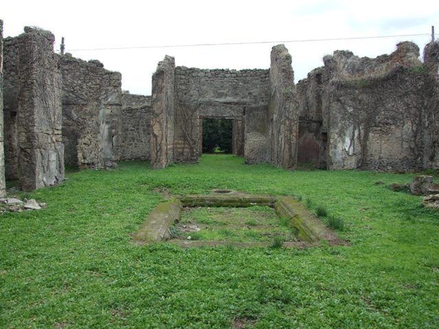 VII.2.20 Pompeii. December 2004. Looking east across atrium, towards rooms, 2, 3, 4 and 5.