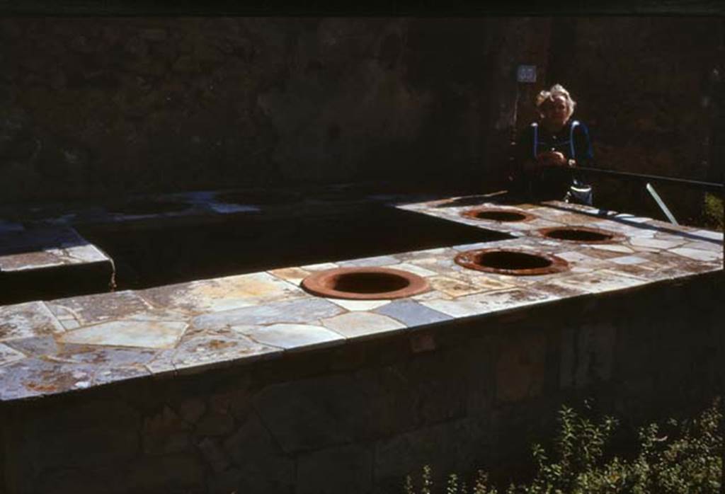 VII.2.32 Pompeii. February 1988. Looking south-east across counter towards other entrance doorway at VII.2.33, on right.
Photo by Joachime M�ric courtesy of Jean-Jacques M�ric.

