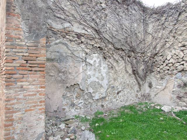 VII.2.34 Pompeii. December 2005. East wall and entrance to shop.