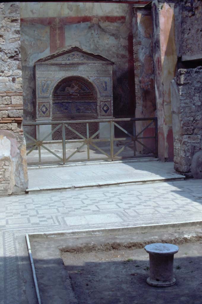 VII.2.45, Pompeii. 4th December 1971. Looking across impluvium towards tablinum.
Photo courtesy of Rick Bauer, from Dr George Fay’s slides collection.