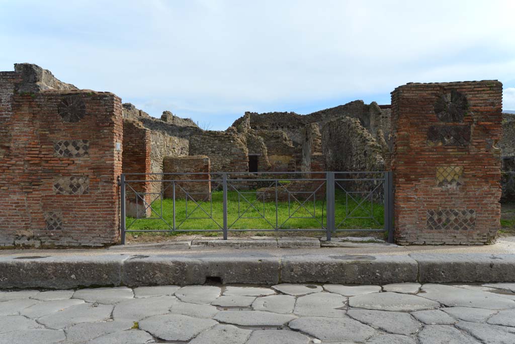 VII.3.8 Pompeii. December 2007. Looking south across shop to large room with a window, and corridor to rear at side.