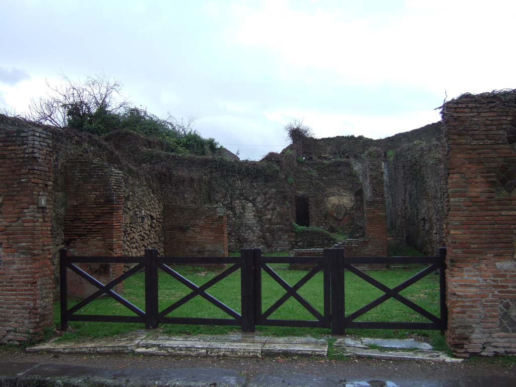 VII.3.8 Pompeii. December 2007. West wall of shop, with niche.