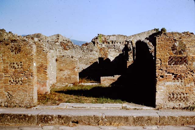 VII.3.8 Pompeii. December 2007. Niche in west wall of shop. According to Boyce, this was an arched niche. See Boyce G. K., 1937. Corpus of the Lararia of Pompeii. Rome: MAAR 14. (p. 63, no: 260A)