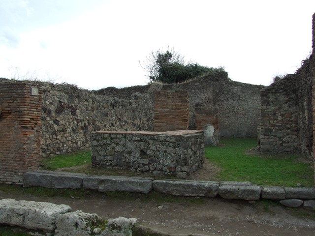 VII.3.9 Pompeii. December 2007. Hearth or oven on west wall.