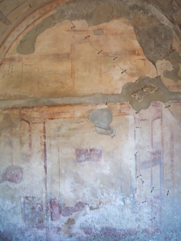 VII.3.21 Pompeii. March 2009. Looking west towards garden area of VII.3.21. This is at the rear of the triclinium of VII.3.13, in the foreground. Apart from the garden area, there was also a small room or cupboard, kitchen and latrine. According to Boyce, in the east wall of the kitchen between the hearth and the latrine, was a small rectangular niche. Inside the niche, its walls were coated with red stucco.
See Boyce G. K., 1937. Corpus of the Lararia of Pompeii. Rome: MAAR 14. (p. 64, no. 268)