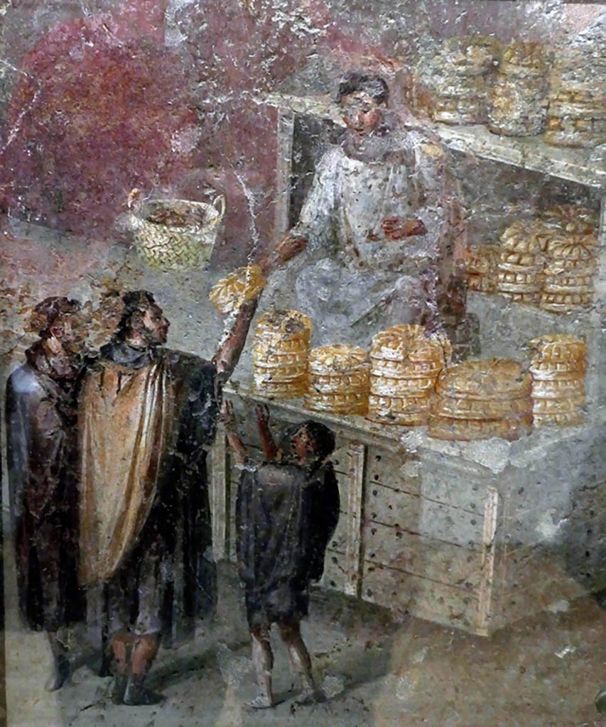 VII.3.30 Pompeii. Found in the tablinum.
Wall painting of The Breadseller or The Distribution of Bread or The Baker’s shop.
Now in Naples Archaeological Museum. Inventory number 9071
Photo courtesy of Giuseppe Ciaramella taken December 2019.