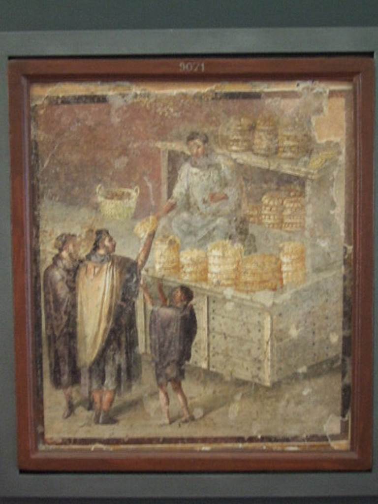 Found in VII.3.30 Pompeii. Casa del Panettiere. Wall painting of The Breadseller or the Distribution of Bread or The Bakers shop. Now in Naples Archaeological Museum. Inventory number 9071.