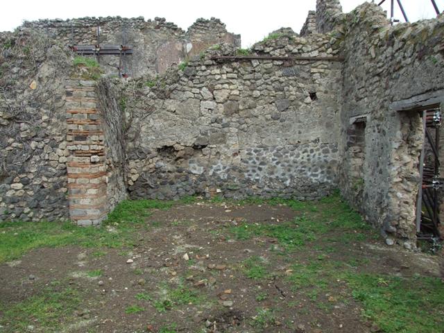 VII.3.34 Pompeii. March 2009. Looking north into room connected to VII.3.35, separated by two brick pilasters.