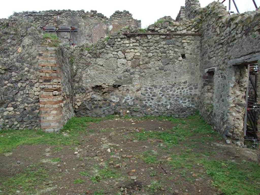 VII.3.34 Pompeii. March 2009. Looking north into room connected to VII.3.35, separated by two brick pilasters.