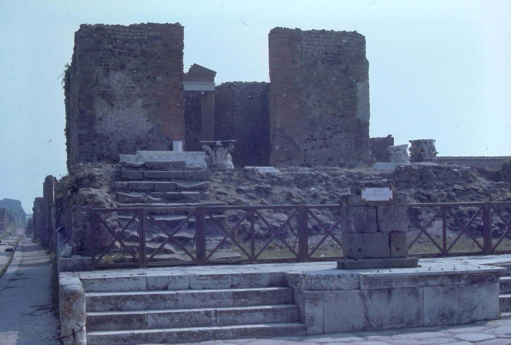 VII.4.1 Pompeii, 8th August 1976. Looking east towards entrance on Via del Foro.
Photo courtesy of Rick Bauer, from Dr George Fay’s slides collection.