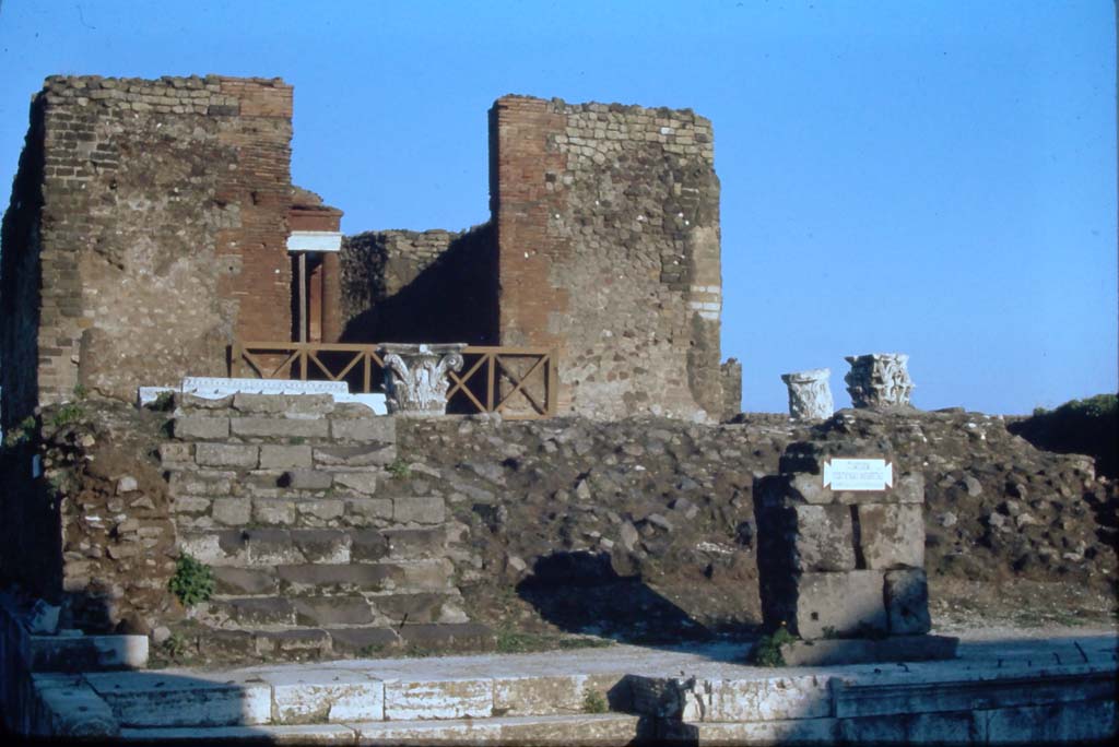 VII.4.1 Pompeii. 4th December 1971. Looking east towards upper podium.
Photo courtesy of Rick Bauer, from Dr.George Fay’s slides collection.