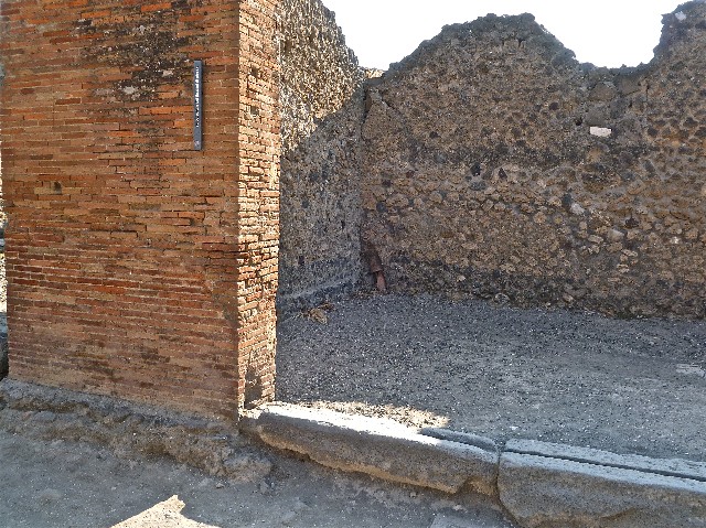 “Cornice in terracotta of a Compluvium preserved at Pompeii”.  
Old photograph courtesy of Society of Antiquaries, Fox Collection.
These are Grondaia or rainwater spouts that fed rainwater from the Compluvium in the roof to the Impluvium below.   These were reconstructed and displayed during the 19th century in VII.4.15/16 before the Antiquarium was opened. Mau says they were originally from a House near the Porta Marina,  The plan provided by Mau can be used to identify the house as VII.16.12/15 the House of Umbricius Scaurus. See Mau, A., 1907, translated by Kelsey F. W. Pompeii: Its Life and Art. New York: Macmillan. (p.251, p.253, p.298).
