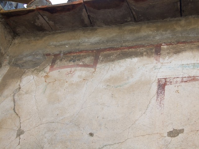 VII.4.31 Pompeii.  March 2009. Room 29. Apsidal Exedra.  Wall painting of A priestess receiving the offerings from a maid to deposit upon the altar.

