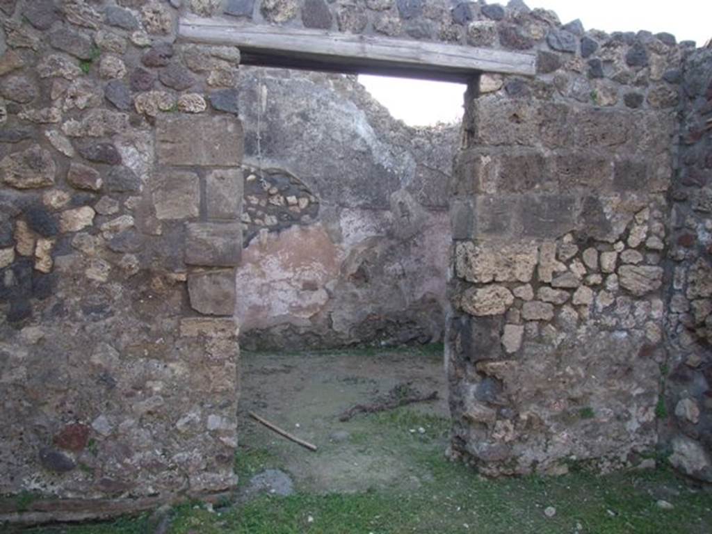 VII.4.31 Pompeii.  March 2009. Room 33.  Detail of painted decoration. North end of Upper West wall.