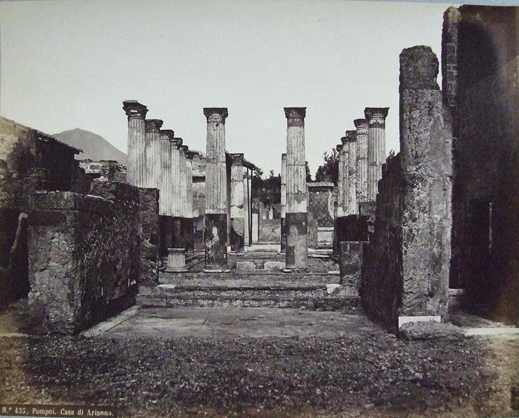 VII.4.31/51 Pompeii. Casa di Arianna. Tablinum and peristyle from atrium.
Old 19th century photograph, number 435, by Roberto Rive. Courtesy of Society of Antiquaries. Fox Collection.
The arca base block is shown in this photograph, on the right-hand side, at the base of the wall.