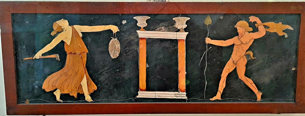VII.4.31/51 Pompeii. September 2024. Found in tablinum on 22nd May 1845. Dionysian scene in coloured marble.
Now in Naples Archaeological Museum. Inventory number 9977. Photo courtesy of Giuseppe Ciaramella.
According to PAH II, 440, two opus sectile panels were found in VII.2.38.
According to Naples Museum and PPM, these were found in VII.4.31/51.
See Carratelli, G. P., 1990-2003. Pompei: Pitture e Mosaici. Roma: Istituto della enciclopedia italiana. (245-13-14).
See Pagano, M., and Prisciandaro, R., 2006. Studio sulle provenienze degli oggetti rinvenuti negli scavi borbonici del regno di Napoli: Naples: Nicola Longobardi. (p.160-1).