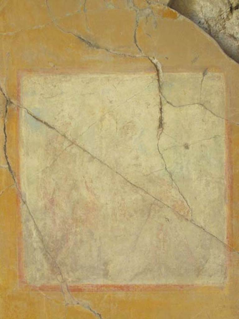 VII.4.31/51 Pompeii. May 2012. Room 12, oecus. Remains of very faded wall painting on east wall. A seated Ciparissus is on the right with a stag by his side, and Apollo standing on the left. Photo courtesy of Marina Fuxa.