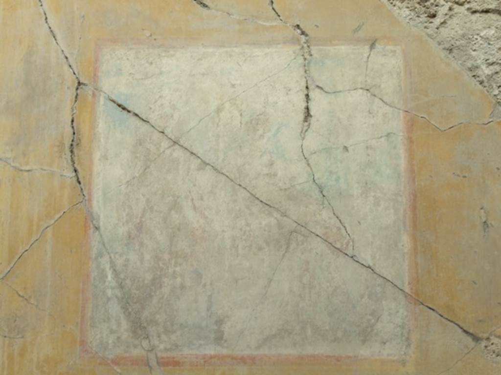 VII.4.31 Pompeii. March 2009. Room 12. Oecus. Remains of very faded wall painting. A seated Ciparissus is on the right with a stag by his side, and Apollo standing on the left.