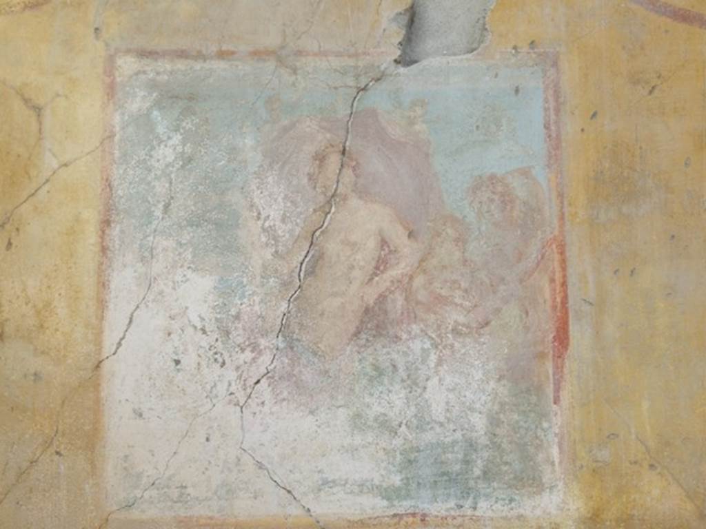 VII.4.31 Pompeii. March 2009. Room 12. Oecus. South wall. Remains of a Wall painting of Venus on a sea creature, with two Cupids unfolding her mantle as a sail. Venus is leaning on the shoulder of another figure, followed by another Cupid playing the pipes.