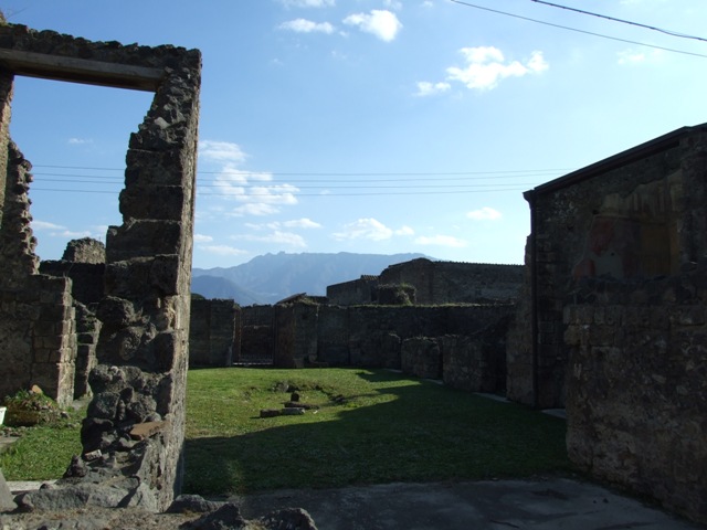 VII.4.31 Pompeii. March 2009. Room 12. Oecus. South wall and south west corner.