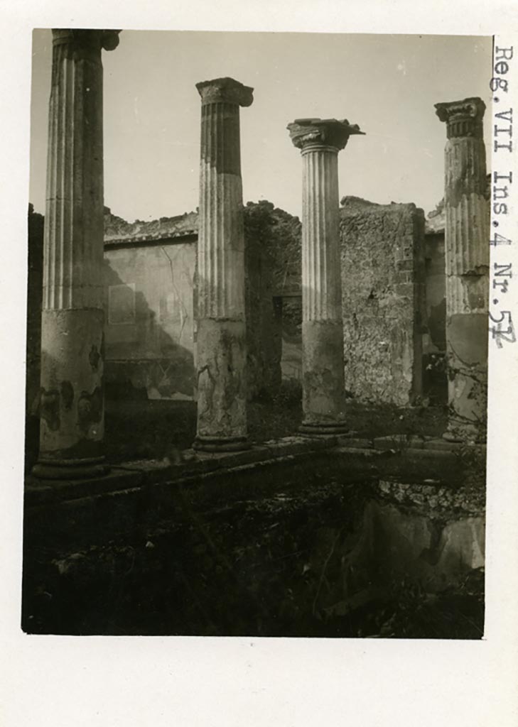 VII.4.31/51 Pompeii but shown as VII.4.57 on photo. Pre-1937-39.
Looking north-west across middle peristyle towards north wall of room 20, on left.
Doorway to room 21, in centre.
Photo courtesy of American Academy in Rome, Photographic Archive. Warsher collection no. 1462.