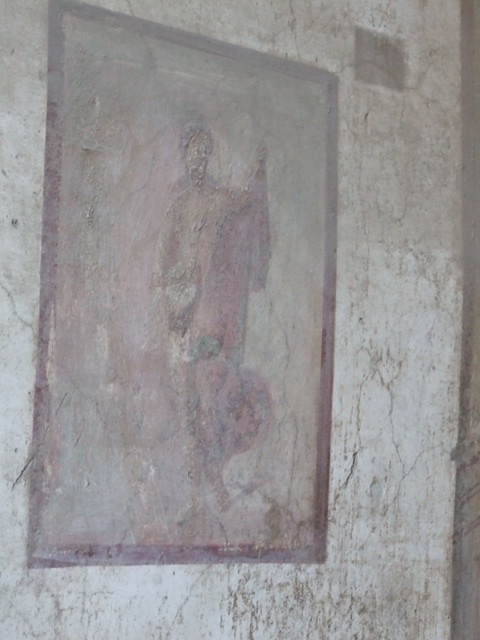 VII.4.48 Pompeii.  March 2009. Room 2.  Atrium. North wall. Painted plaster with faded decoration.
