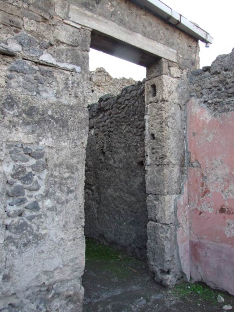 VII.4.48 Pompeii. December 2007. Doorway to room 15. On the atrium west wall dividing room 14 from 15, on the left in this picture, a painted figure of Autumn was seen. On the atrium north wall, on the right, a painted figure of Winter was seen.
See Bragantini, de Vos, Badoni, 1986. Pitture e Pavimenti di Pompei, Parte 3. Rome: ICCD. (p.130, atrio (2))