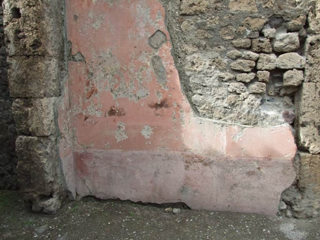 VII.4.48 Pompeii. March 2009. Room 2. Atrium. North west corner and north wall, with remains of painted plaster.