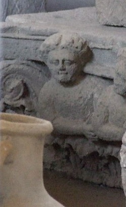 VII.4.51 Pompeii. December 2007. Remains of a capital in storage in the Forum Granary store VII.7.29. The above photo shows the side that would have been pointing onto the Via della Fortuna.