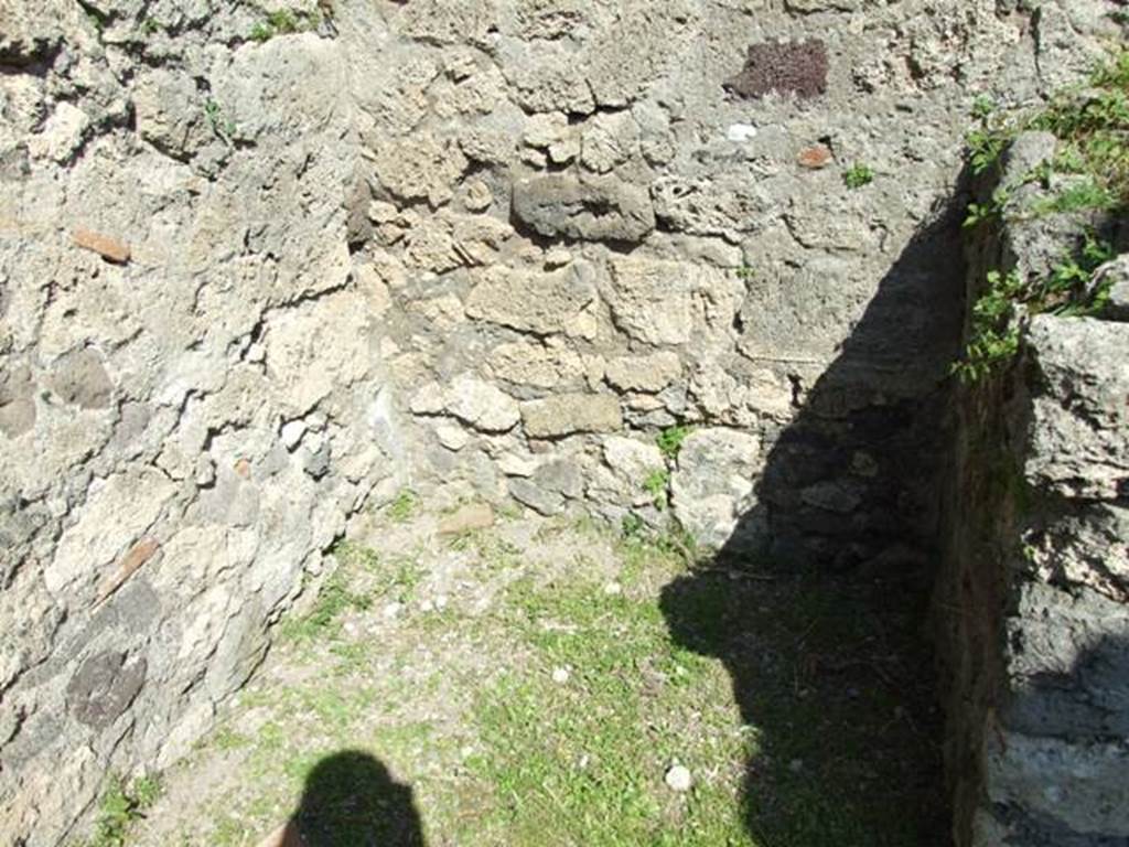 VII.4.57. Pompeii. March 2009. Room 3. Kitchen? North east corner, under stairs.