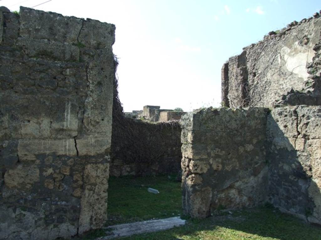 VII.4.57. Pompeii. March 2009. Doorway to Room 12. Triclinium.